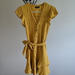 Yellow asymmetrical button down ruffle dress